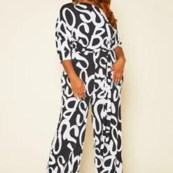 Plus Size Asymmetric Shoulder Abstract Print Jumpsuit